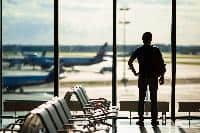man silhouette travel airport no luggage