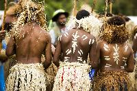 New Caledonia local tradition culture people men paint