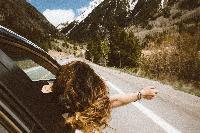 woman road trip open road freedom spontaneous adventure care free