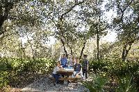Picnicing family in Panama City Beach park conservation